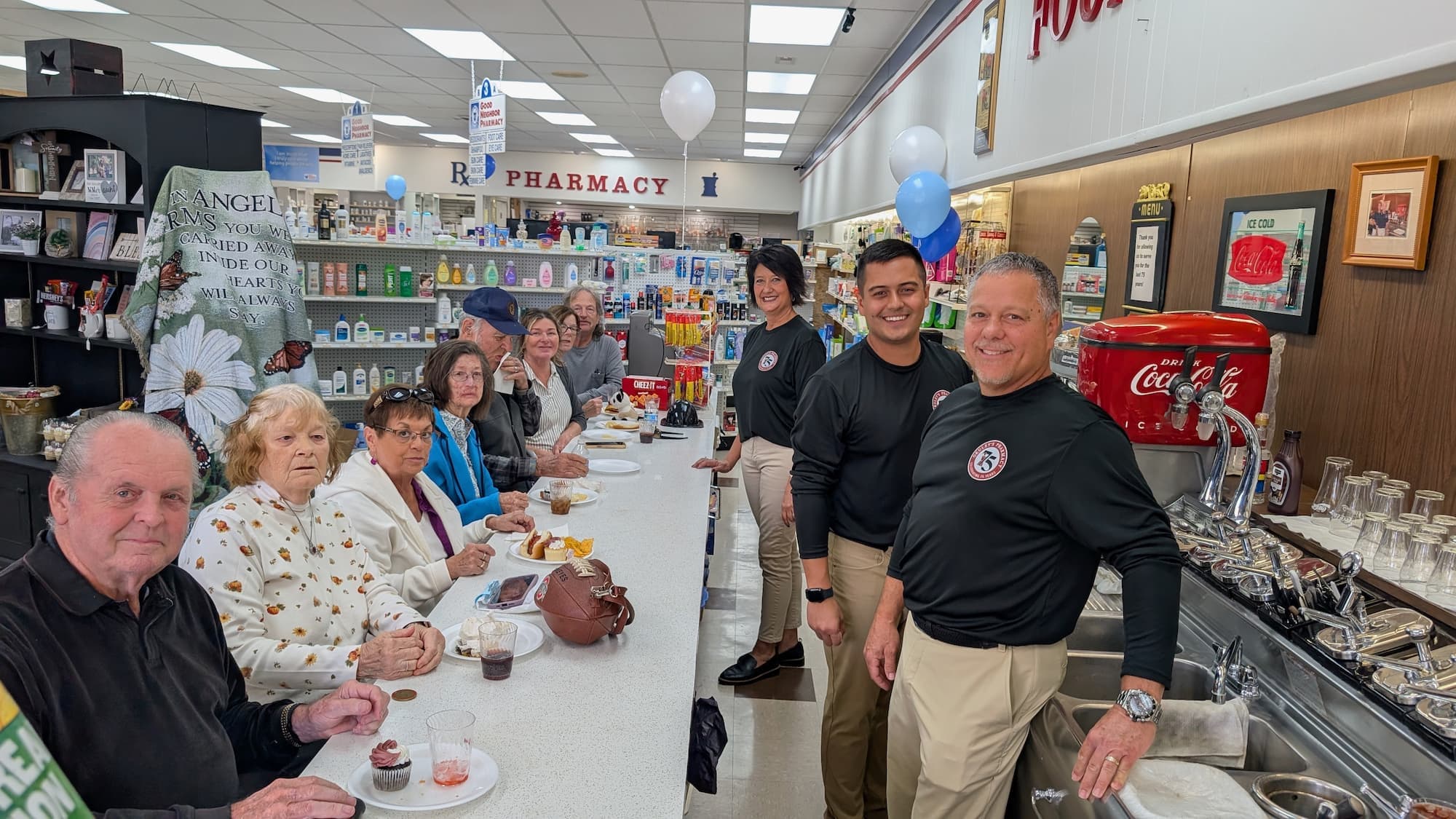 Team members and customers at Okuley's Pharmacy in Northwest Ohio